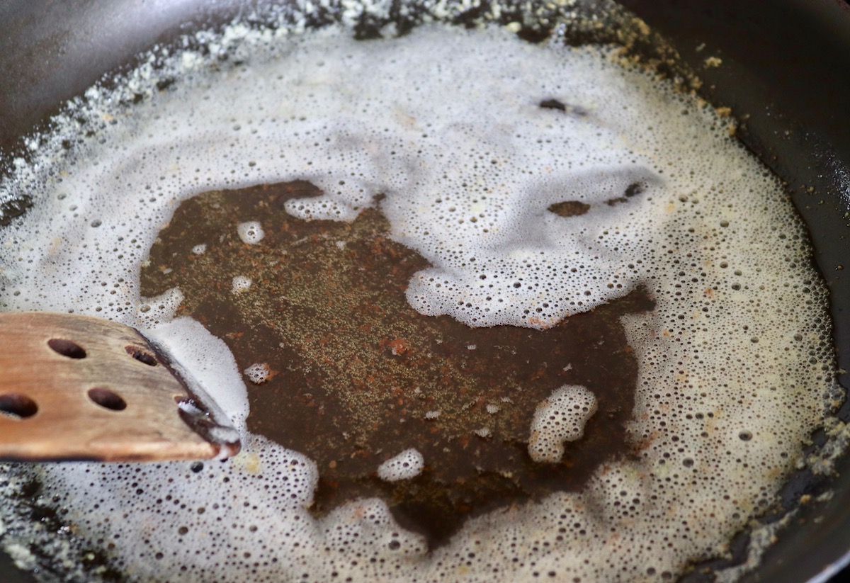 Melted butter that's been browned in a large skillet.